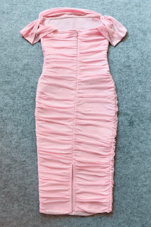 Woman wearing a figure flattering Zia Bodycon Wrap Midi Dress - Dusty Pink Bodycon Collection