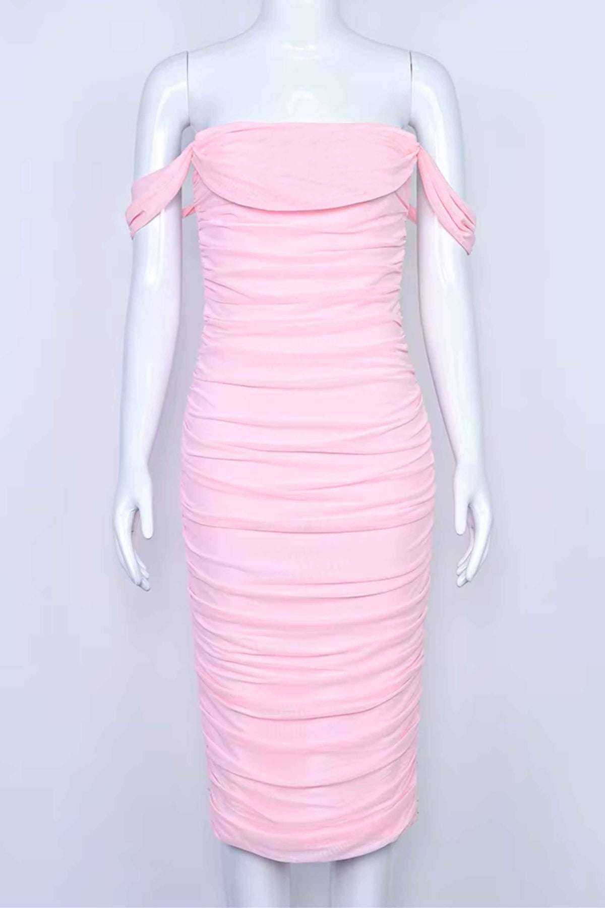 Woman wearing a figure flattering Zia Bodycon Wrap Midi Dress - Dusty Pink Bodycon Collection