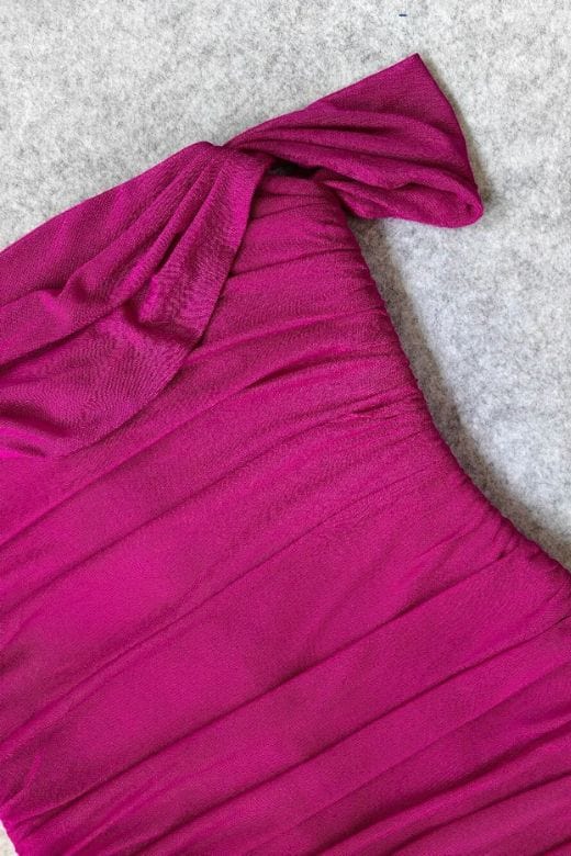 Woman wearing a figure flattering Zia Bodycon Wrap Midi Dress - Magenta Pink Bodycon Collection
