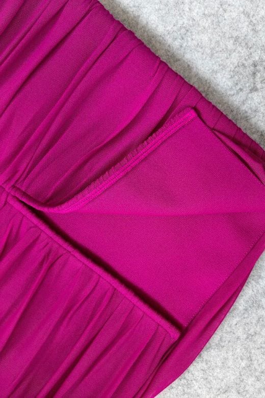 Woman wearing a figure flattering Zia Bodycon Wrap Midi Dress - Magenta Pink Bodycon Collection