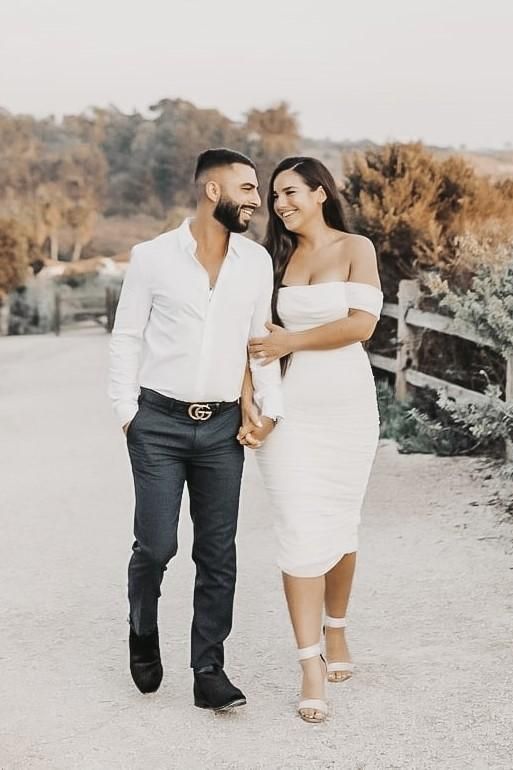 Woman wearing a figure flattering Zia Bodycon Wrap Midi Dress - Red Wine Bodycon Collection