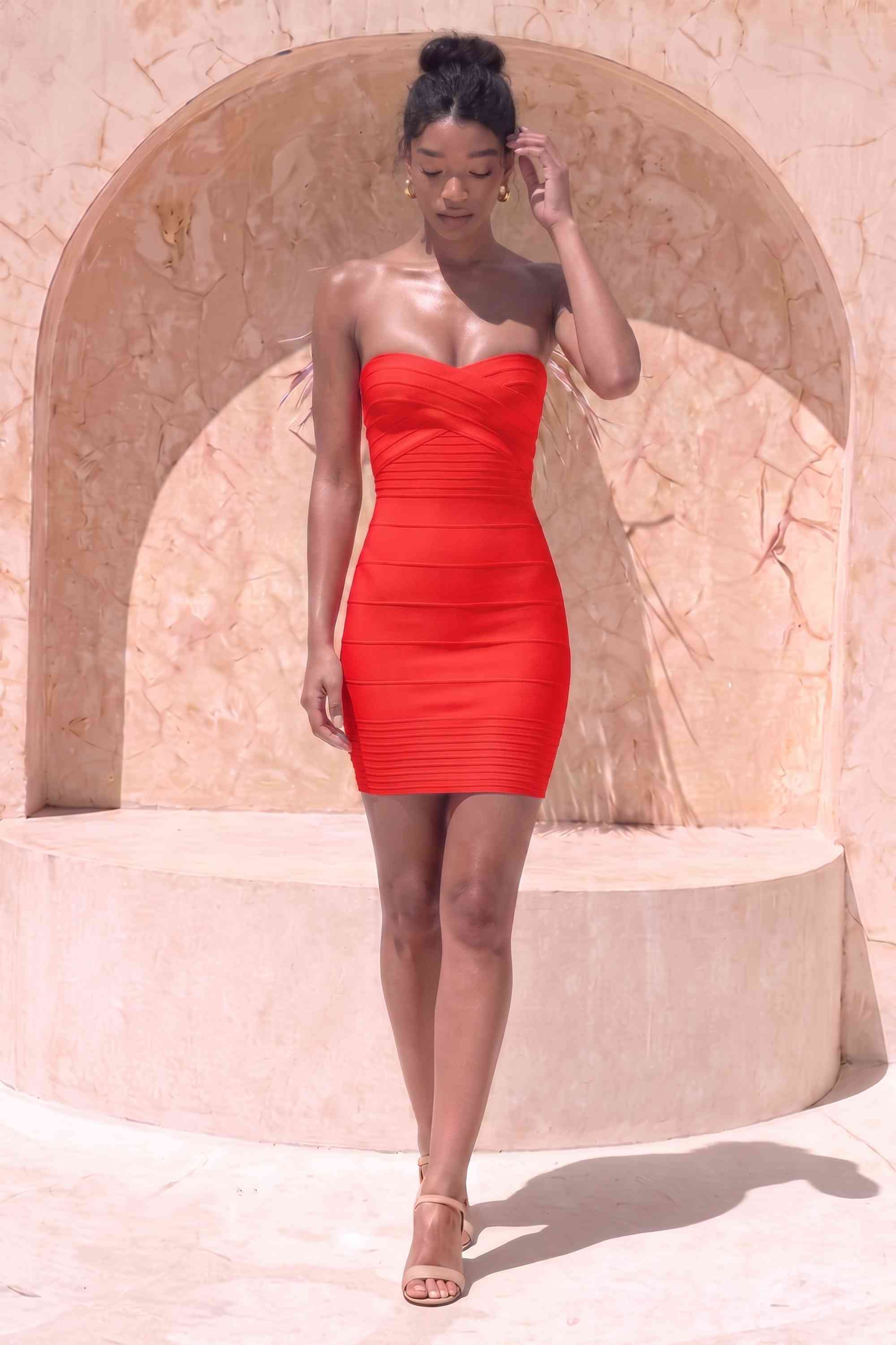Woman wearing a figure flattering  Aaliyah Bandage Mini Dress - Lipstick Red BODYCON COLLECTION