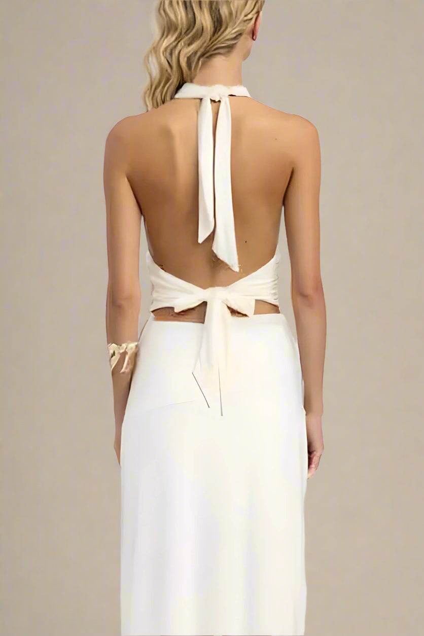 Woman wearing a figure flattering  Aby Bodycon Top - White Pearl BODYCON COLLECTION Pty Ltd