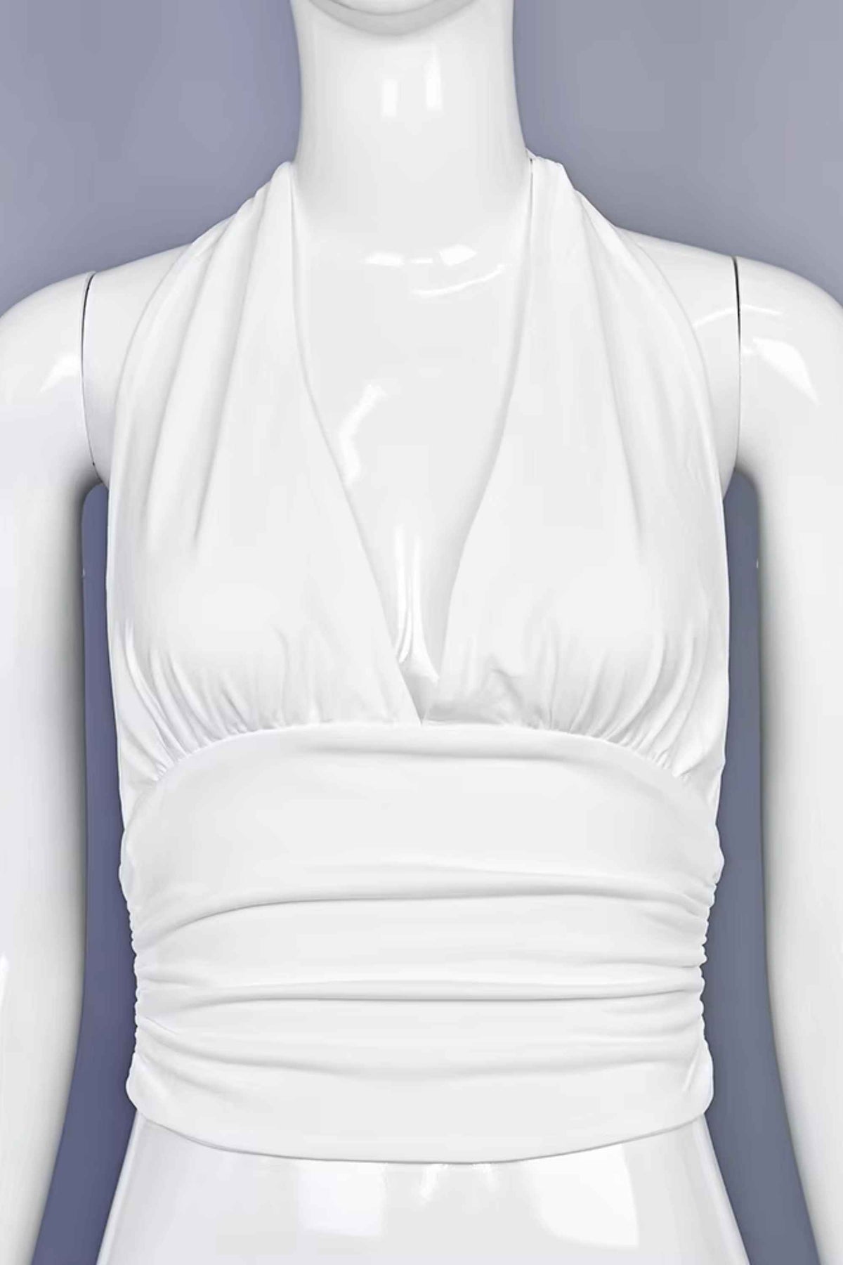 Woman wearing a figure flattering  Aby Halter Top - White Pearl BODYCON COLLECTION Pty Ltd