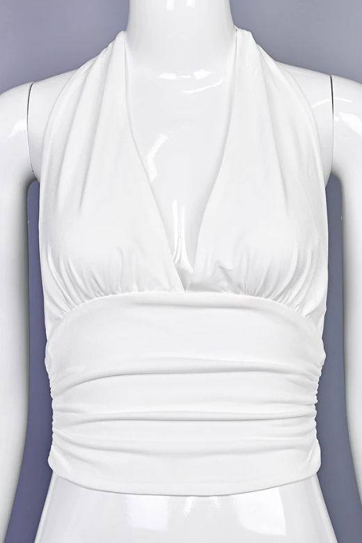 Woman wearing a figure flattering  Aby Halter Top - White Pearl BODYCON COLLECTION Pty Ltd