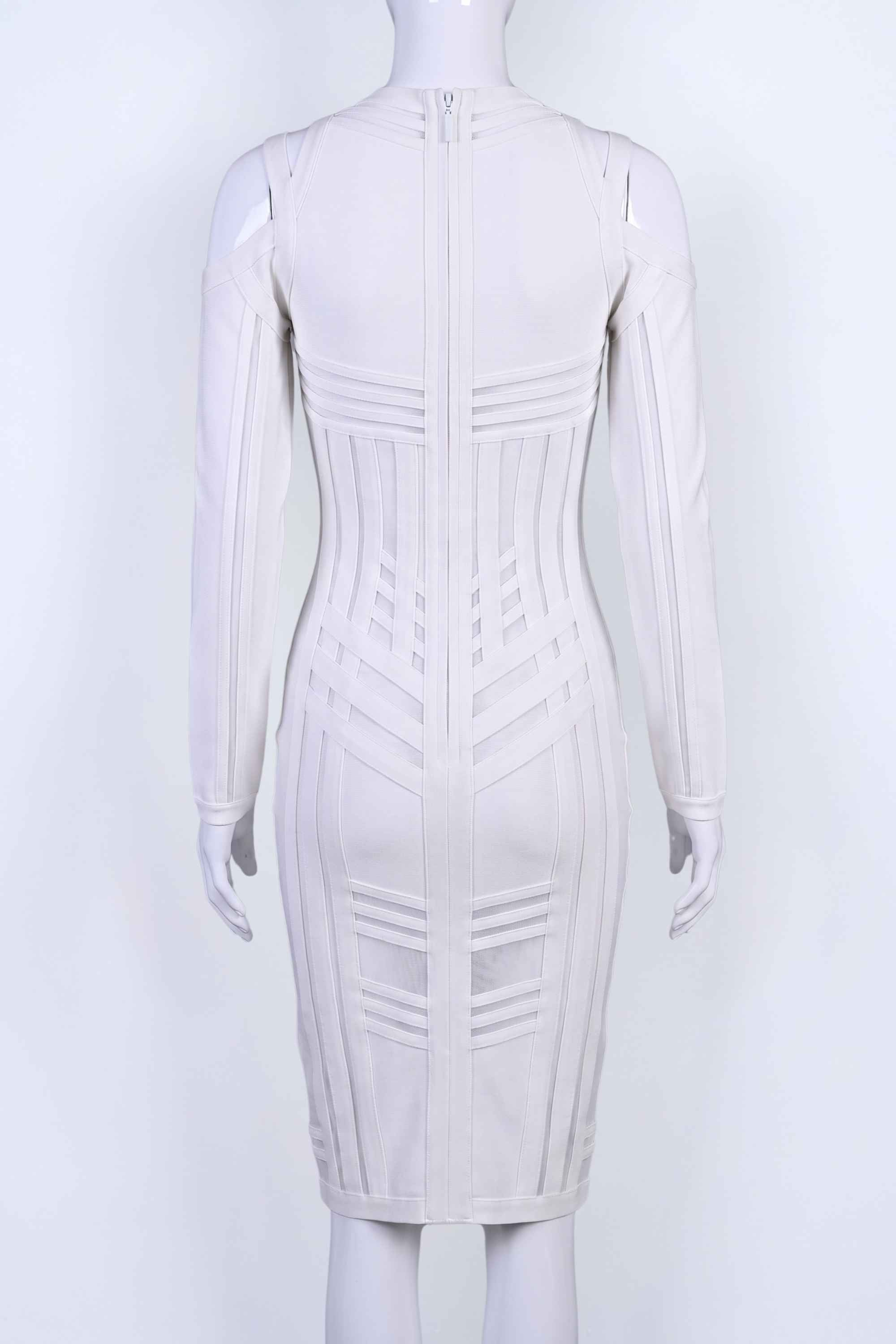 Woman wearing a figure flattering  Amelia Long Sleeve Bandage Dress - Pearl White BODYCON COLLECTION