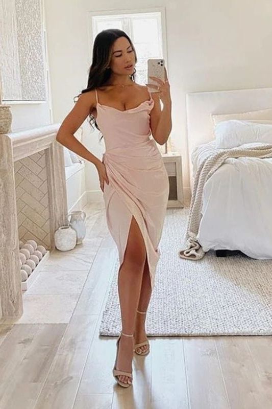 Woman wearing a figure flattering  Angela Bodycon Dress - Blush Pink BODYCON COLLECTION
