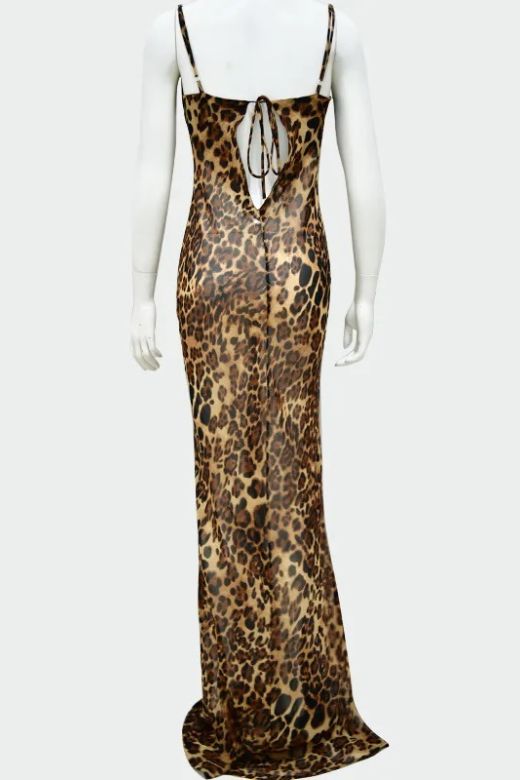 Woman wearing a figure flattering  Athena Bodycon Maxi Dress - Leopard Print Yellow BODYCON COLLECTION