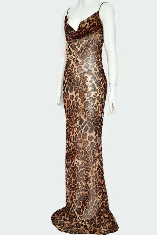 Woman wearing a figure flattering  Athena Bodycon Maxi Dress - Leopard Print Yellow BODYCON COLLECTION