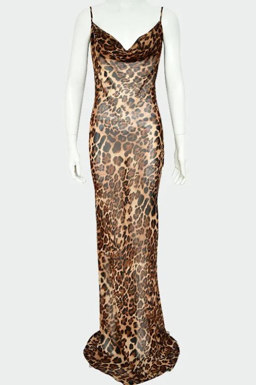 Woman wearing a figure flattering  Athena Bodycon Maxi Dress - Leopard Print Yellow BODYCON COLLECTION