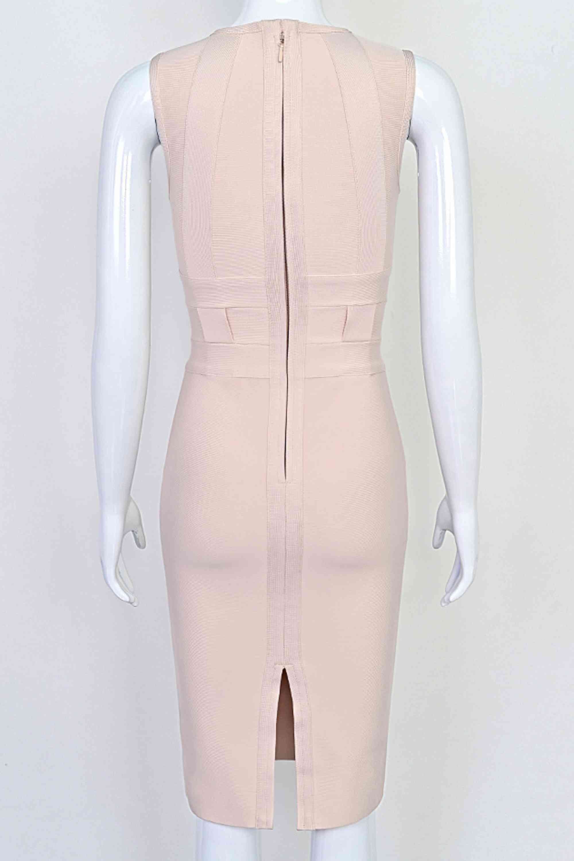 Woman wearing a figure flattering  Aurora Bandage Dress - Cream BODYCON COLLECTION Pty Ltd