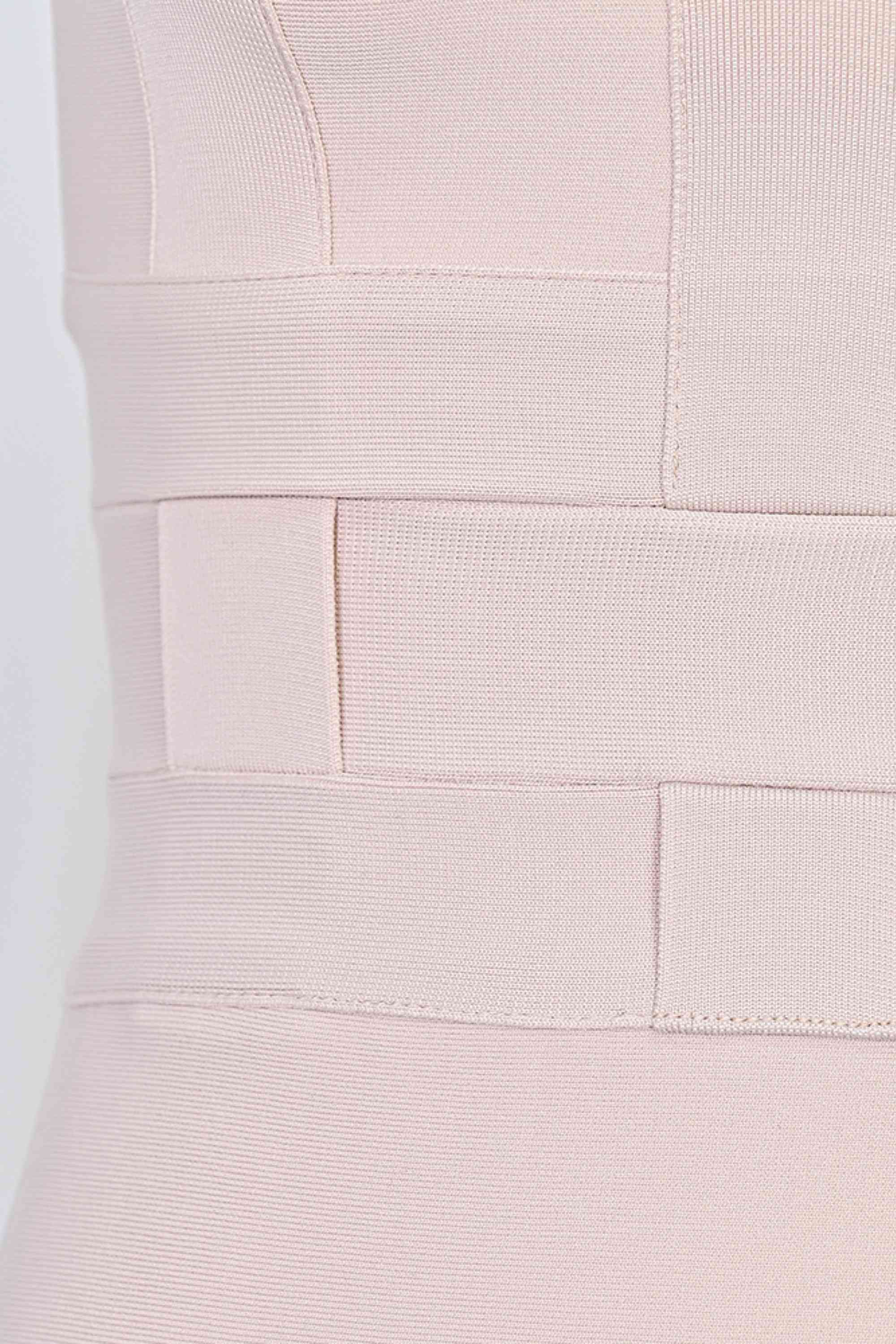 Woman wearing a figure flattering  Aurora Bandage Dress - Cream BODYCON COLLECTION Pty Ltd