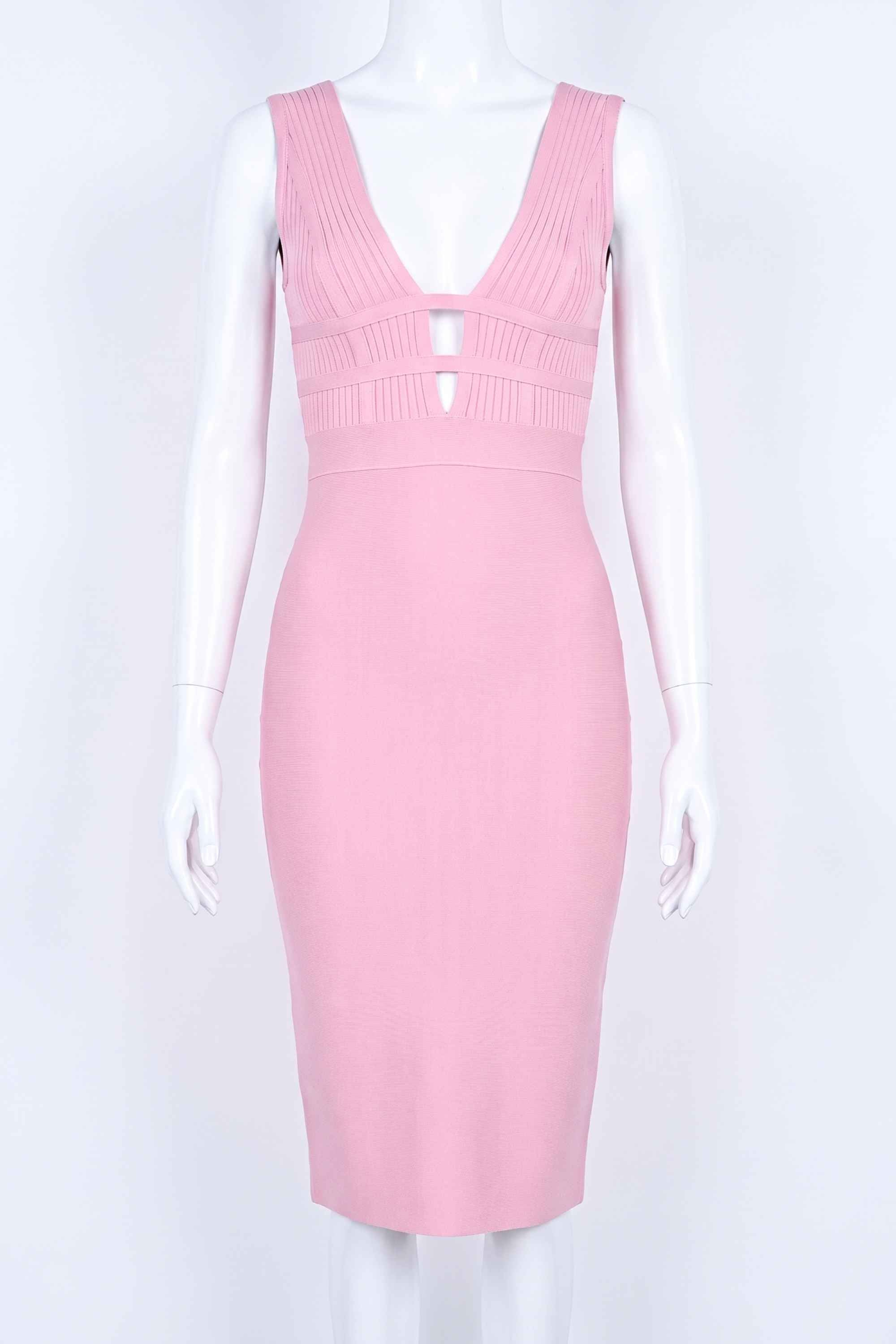 Woman wearing a figure flattering  Bay Bandage Dress - Blush Pink Bodycon Collection