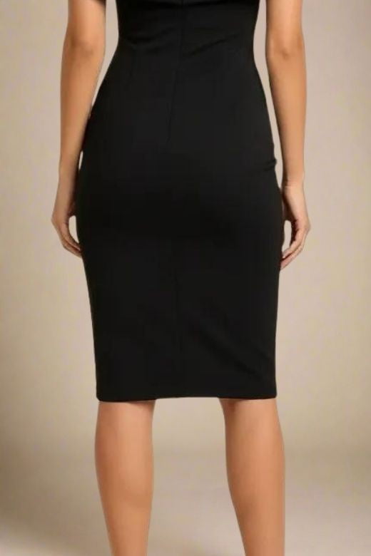 Woman wearing a figure flattering  Bea Bandage Dress - Classic Black Bodycon Collection