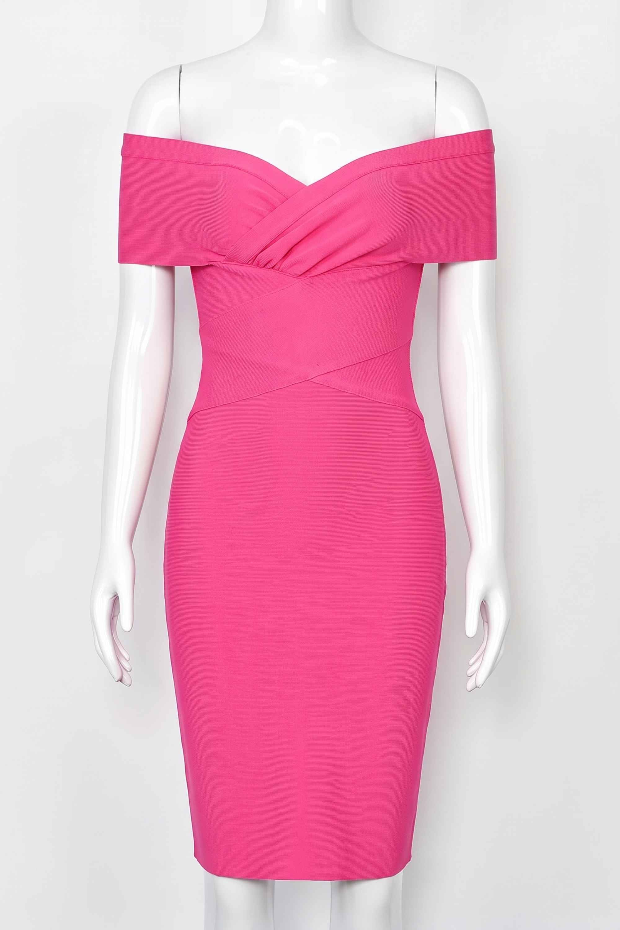 Woman wearing a figure flattering  Bea Bandage Dress - Hot Pink Bodycon Collection