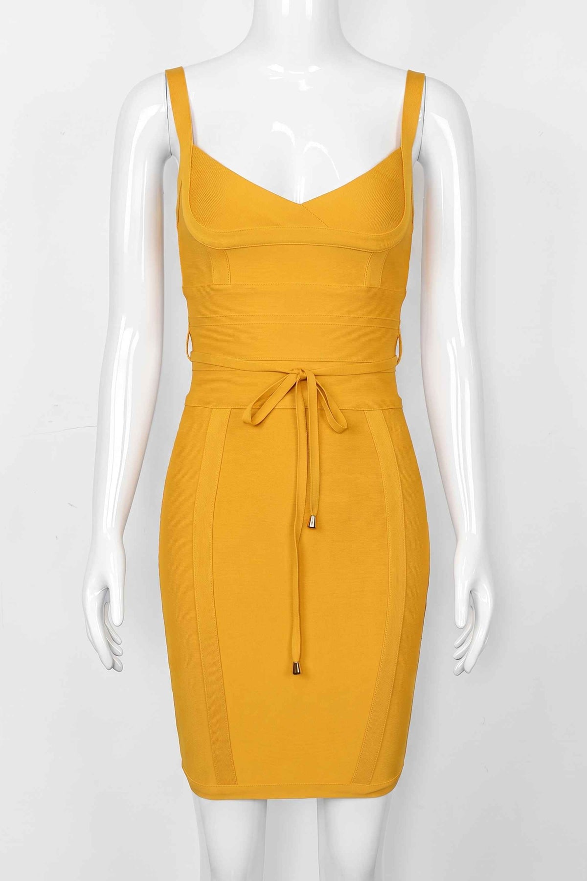 Woman wearing a figure flattering  Bek Bandage Dress - Mustard Yellow Bodycon Collection