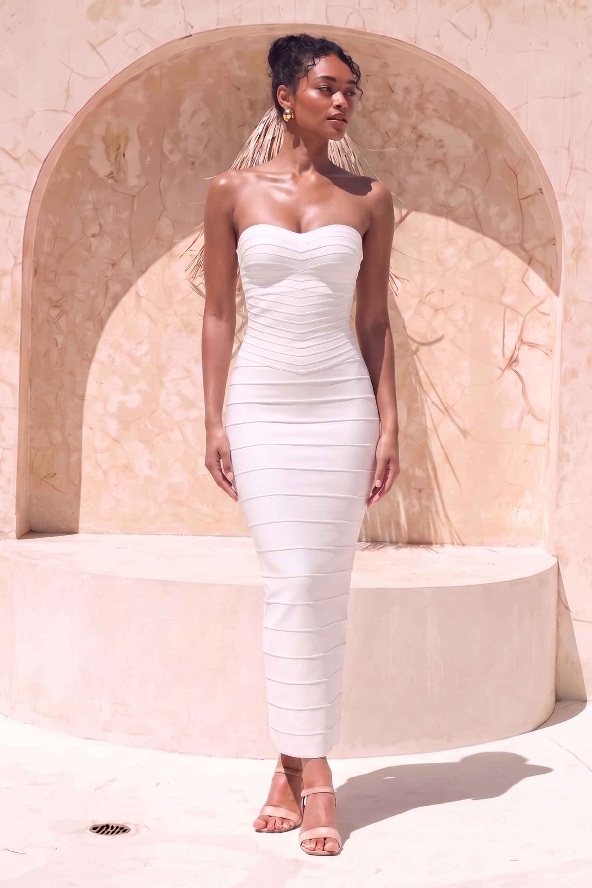 Woman wearing a figure flattering  Belle Bandage Maxi Dress - White Pearl BODYCON COLLECTION Pty Ltd