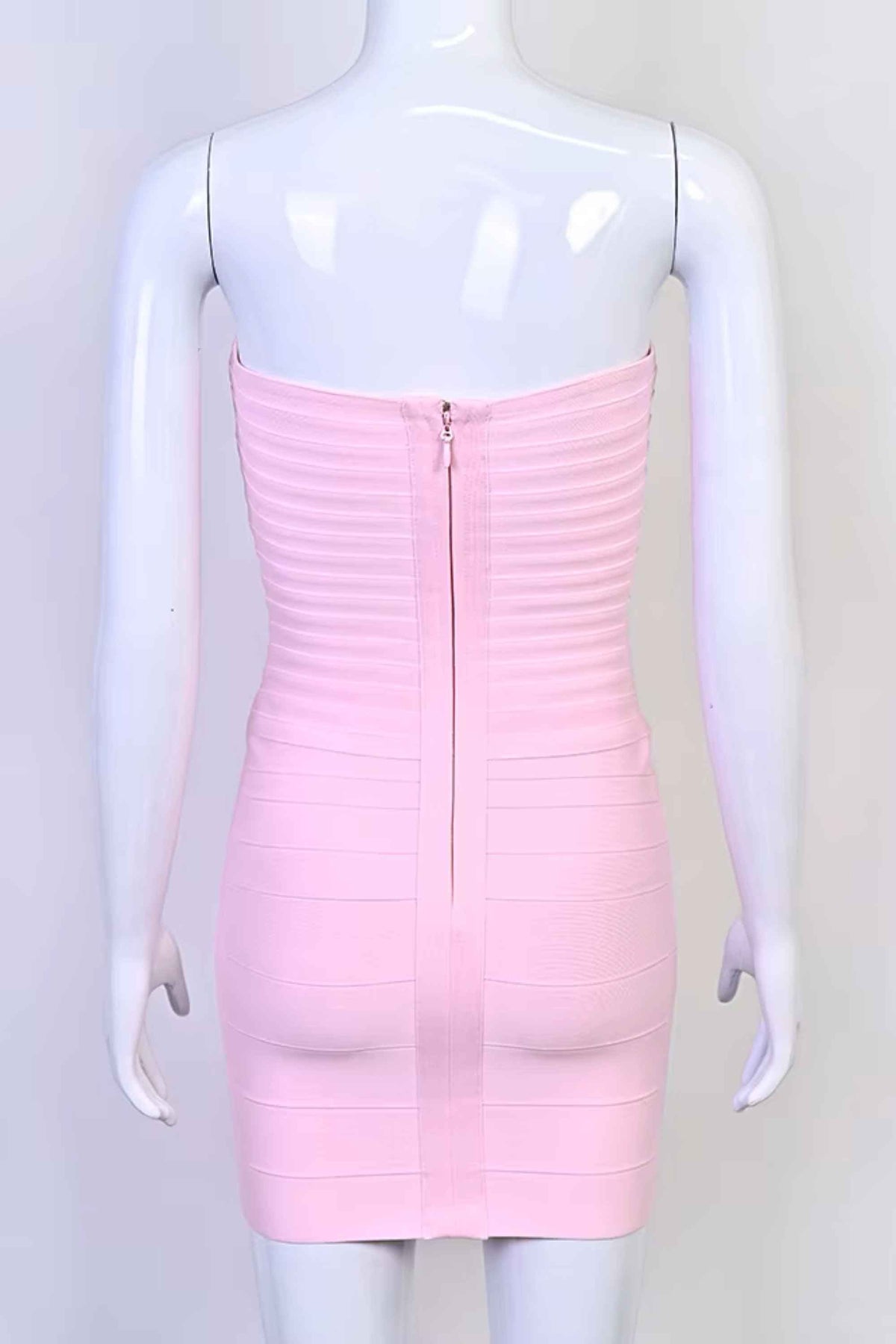 Woman wearing a figure flattering  Belle Bandage Mini Dress - Dusty Pink BODYCON COLLECTION Pty Ltd