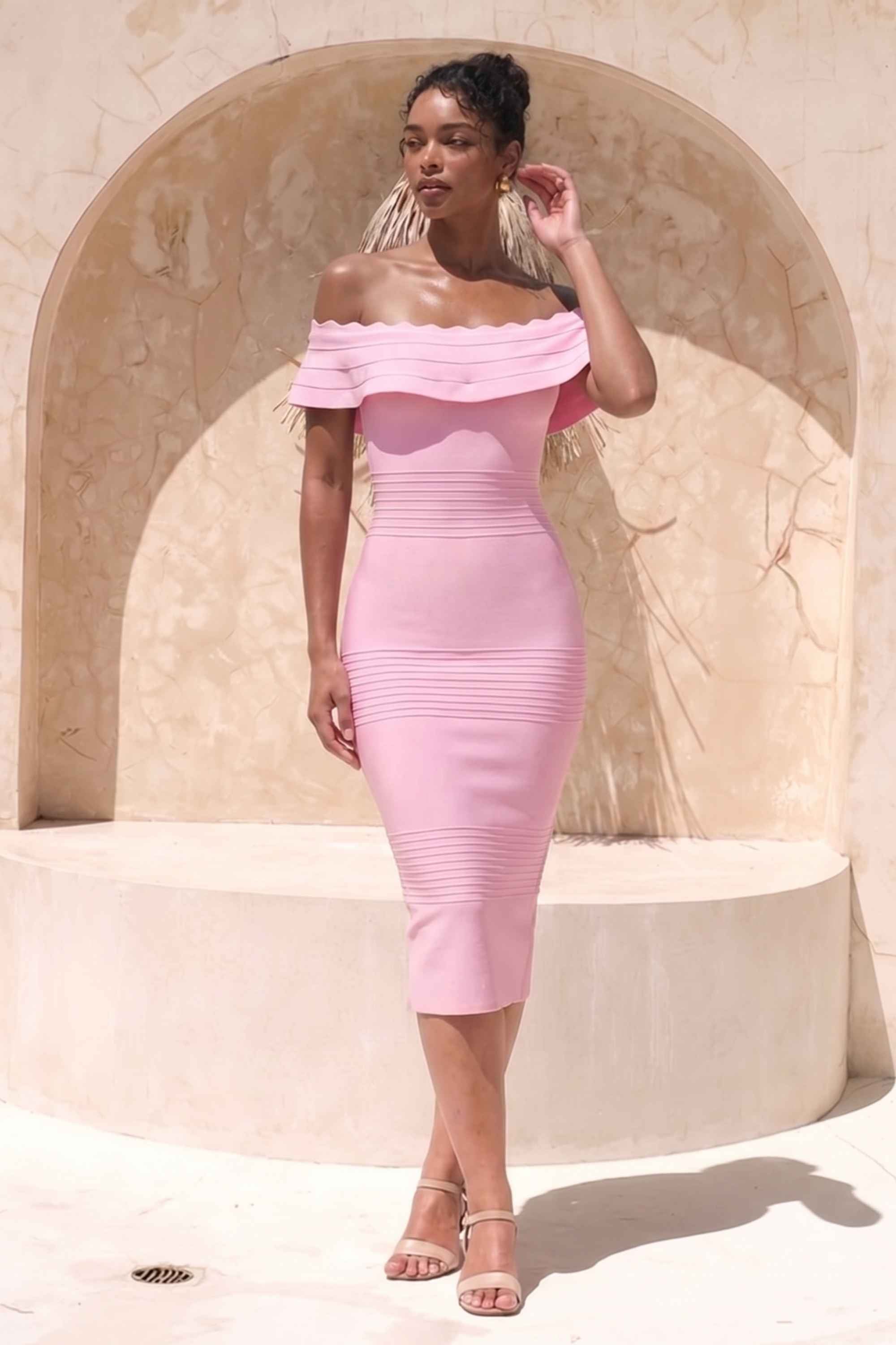Woman wearing a figure flattering  Billie Bandage Midi Dress - Dusty Pink Bodycon Collection