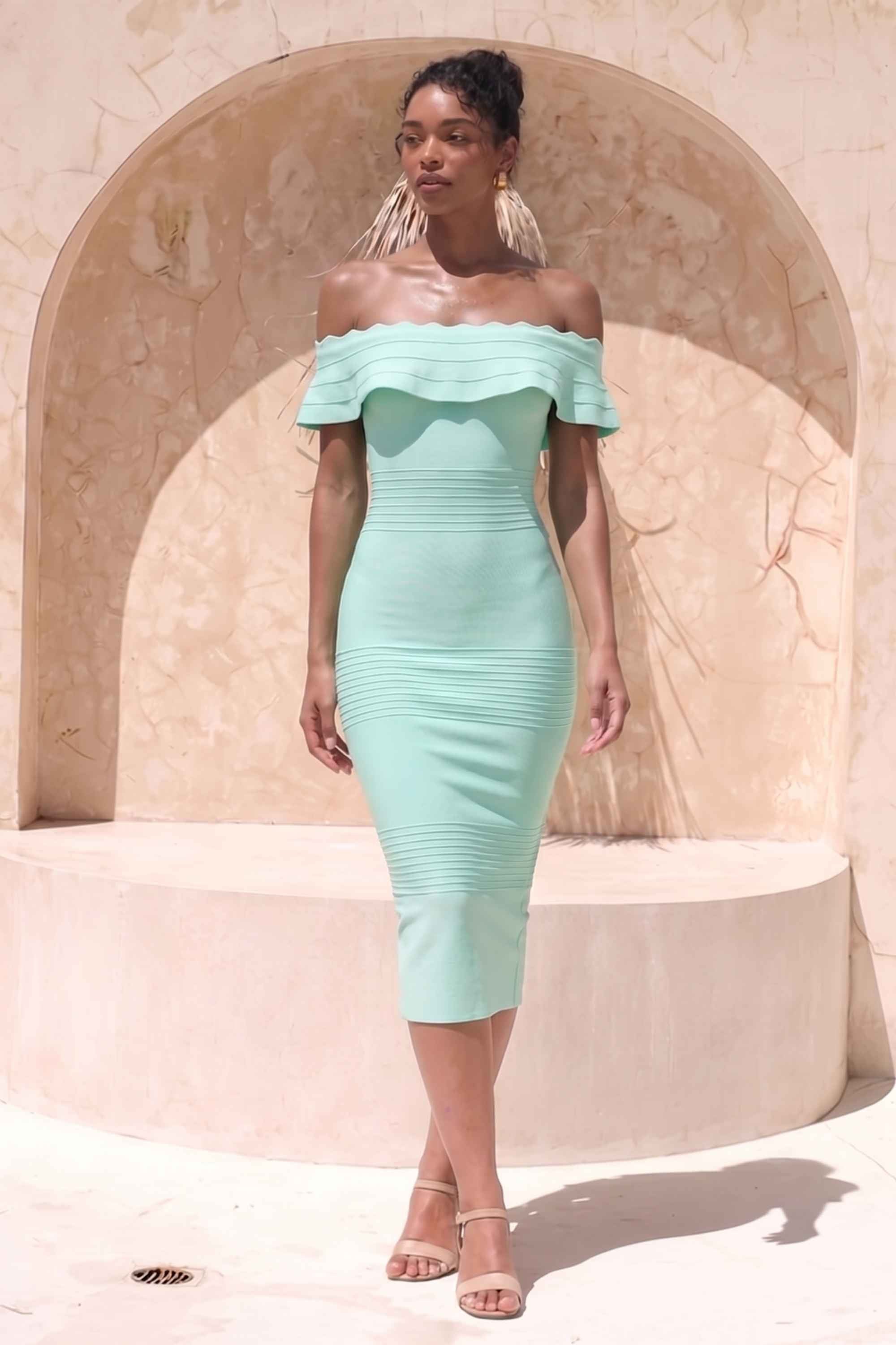 Woman wearing a figure flattering  Billie Bandage Midi Dress - Mint Green Bodycon Collection
