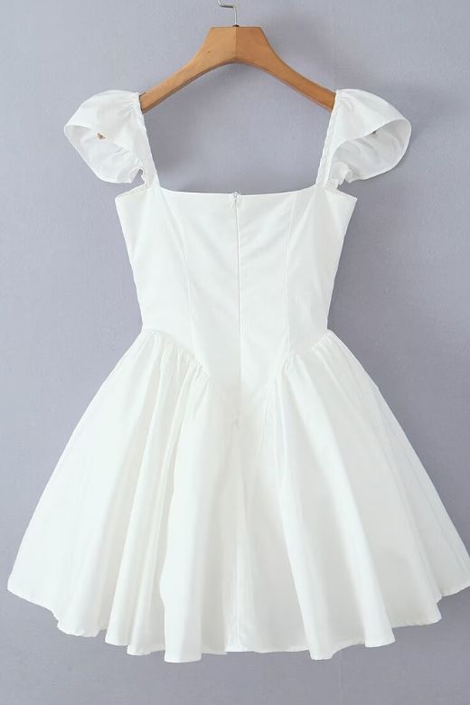 Woman wearing a figure flattering  Cara Bodycon Mini Dress - Pearl White BODYCON COLLECTION