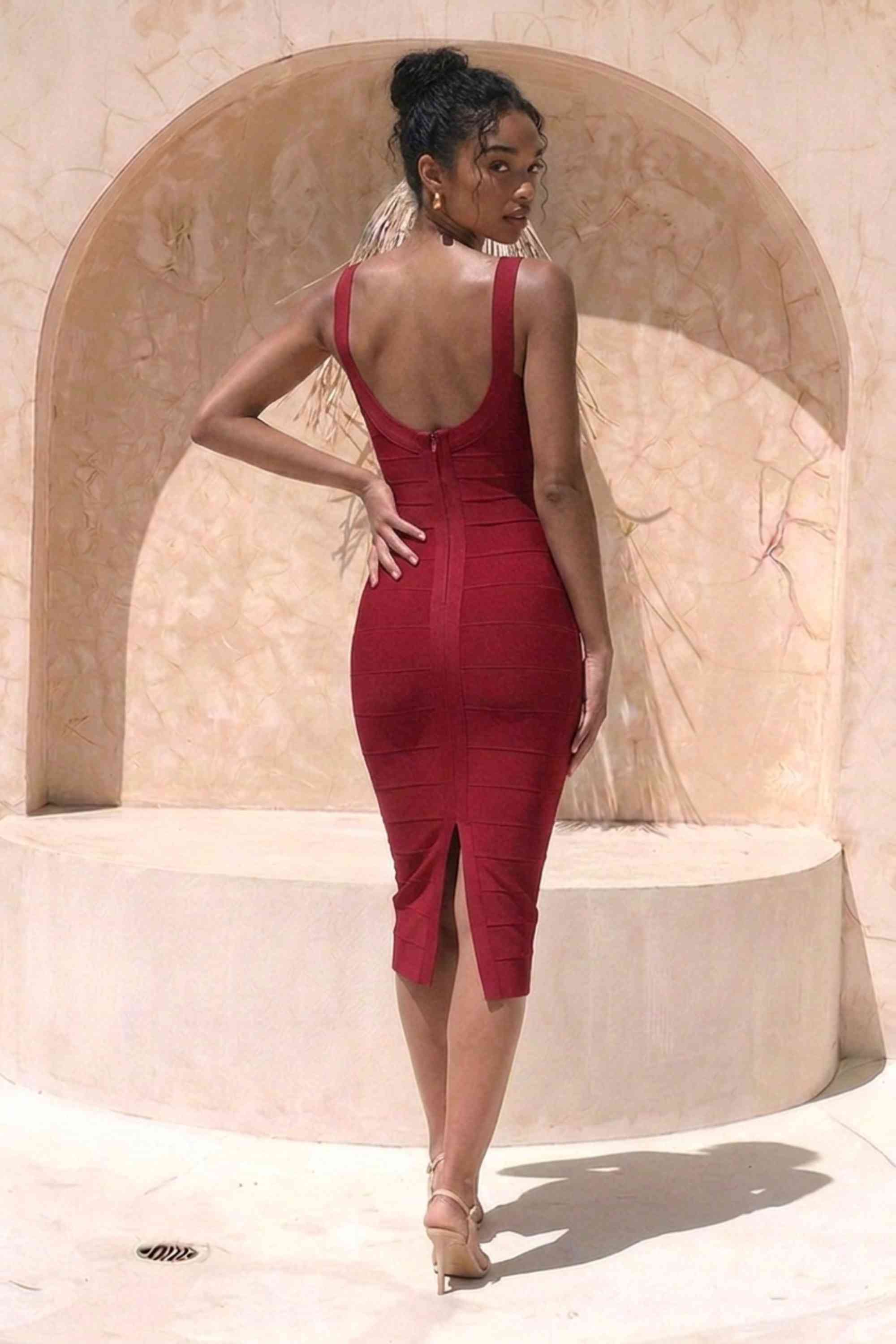 Woman wearing a figure flattering  Cindy Bandage Midi Dress - Red Wine BODYCON COLLECTION Pty Ltd