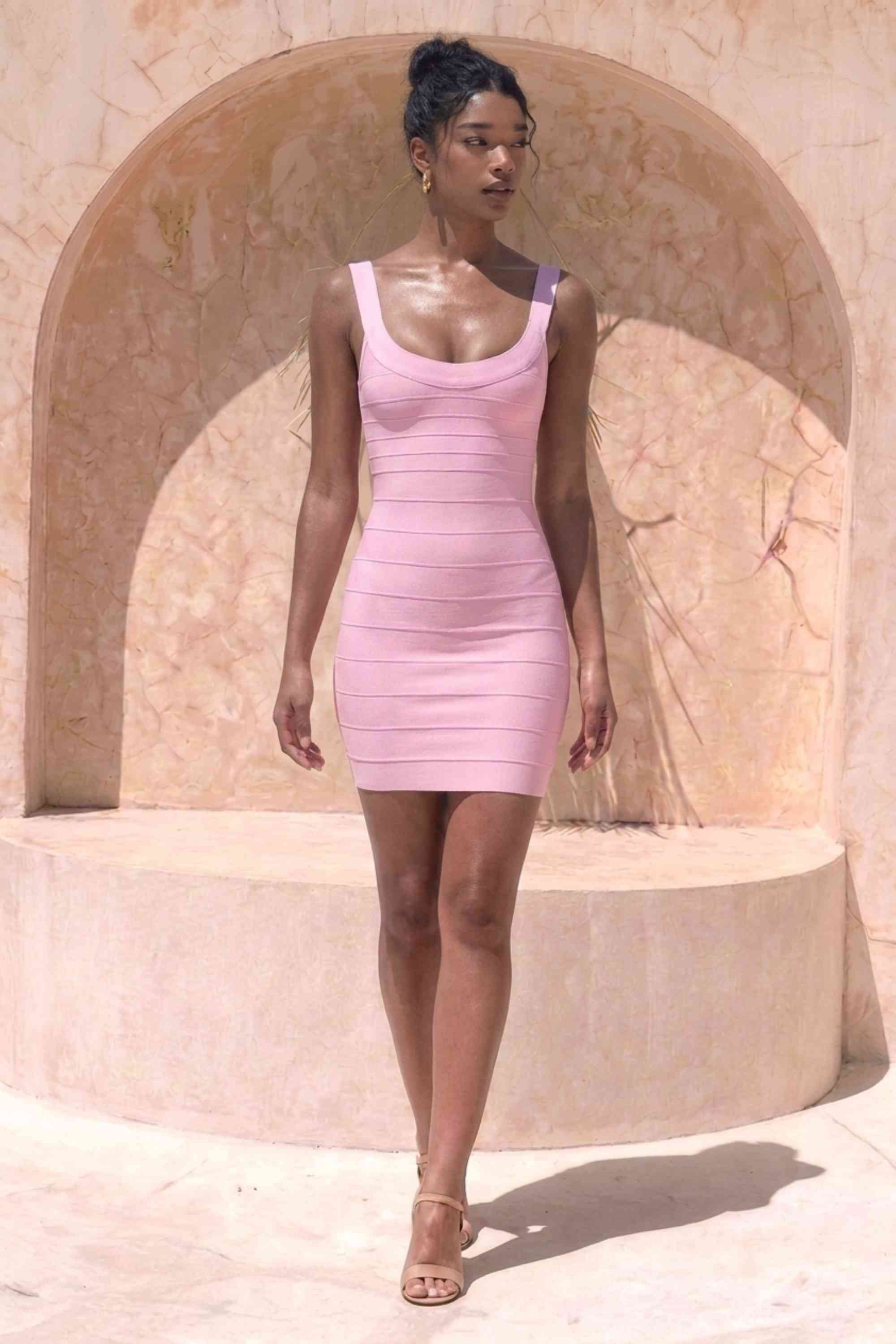 Woman wearing a figure flattering  Cindy Bandage Mini Dress - Dusty Pink BODYCON COLLECTION Pty Ltd