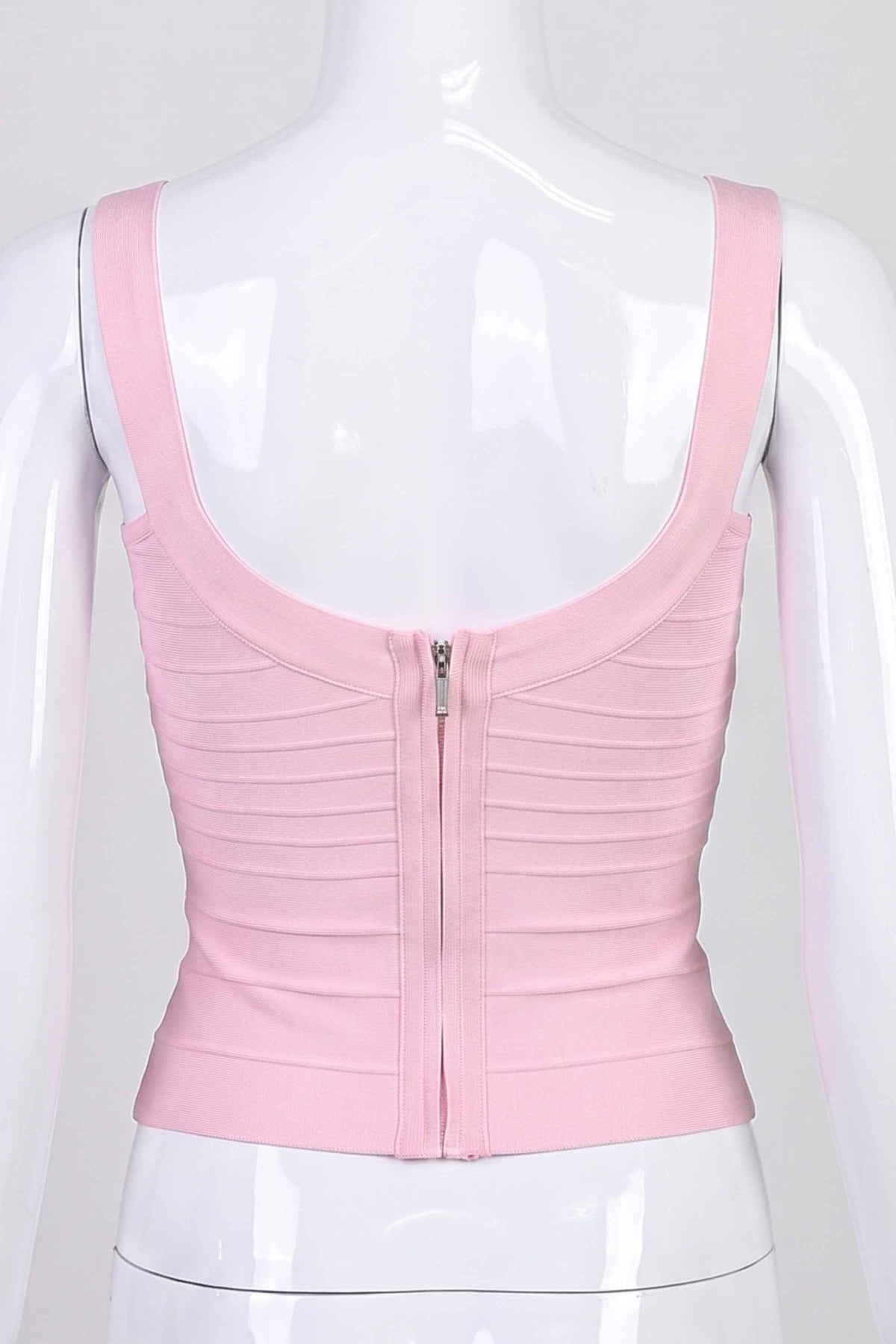 Woman wearing a figure flattering  Cindy Bandage Top - Dusty Pink BODYCON COLLECTION Pty Ltd