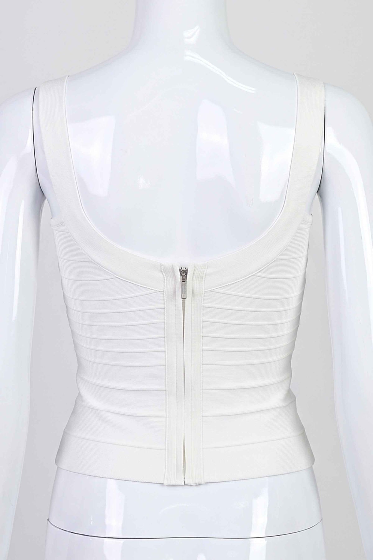 Woman wearing a figure flattering  Cindy Bandage Top - Pearl White BODYCON COLLECTION Pty Ltd