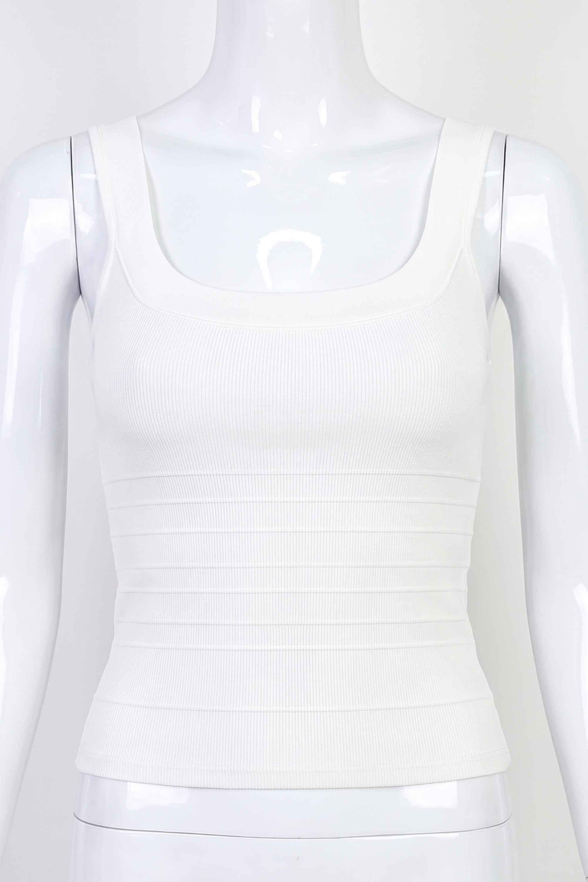 Woman wearing a figure flattering  Cindy Bandage Top - Pearl White BODYCON COLLECTION Pty Ltd