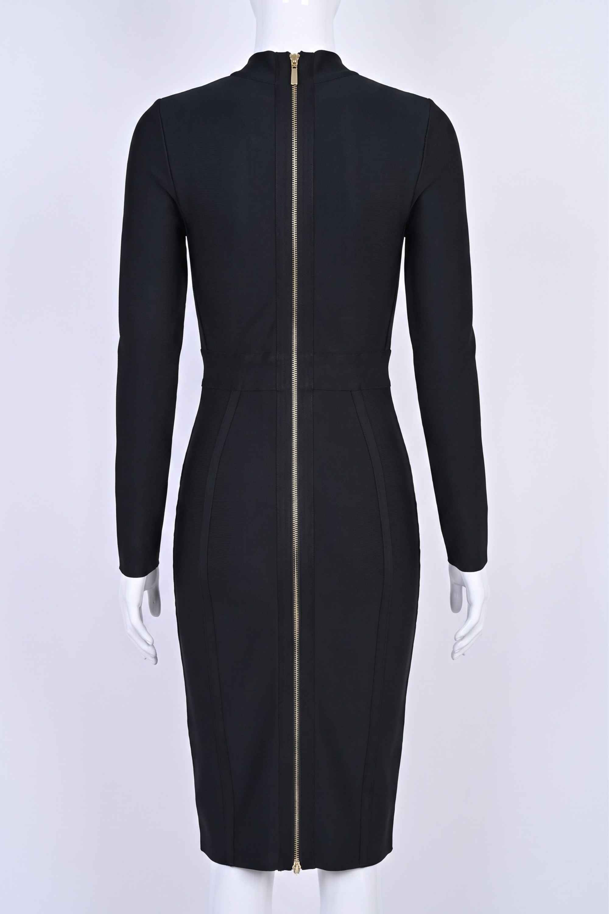 Woman wearing a figure flattering  Dee Long Sleeve Bandage Dress - Classic Black BODYCON COLLECTION