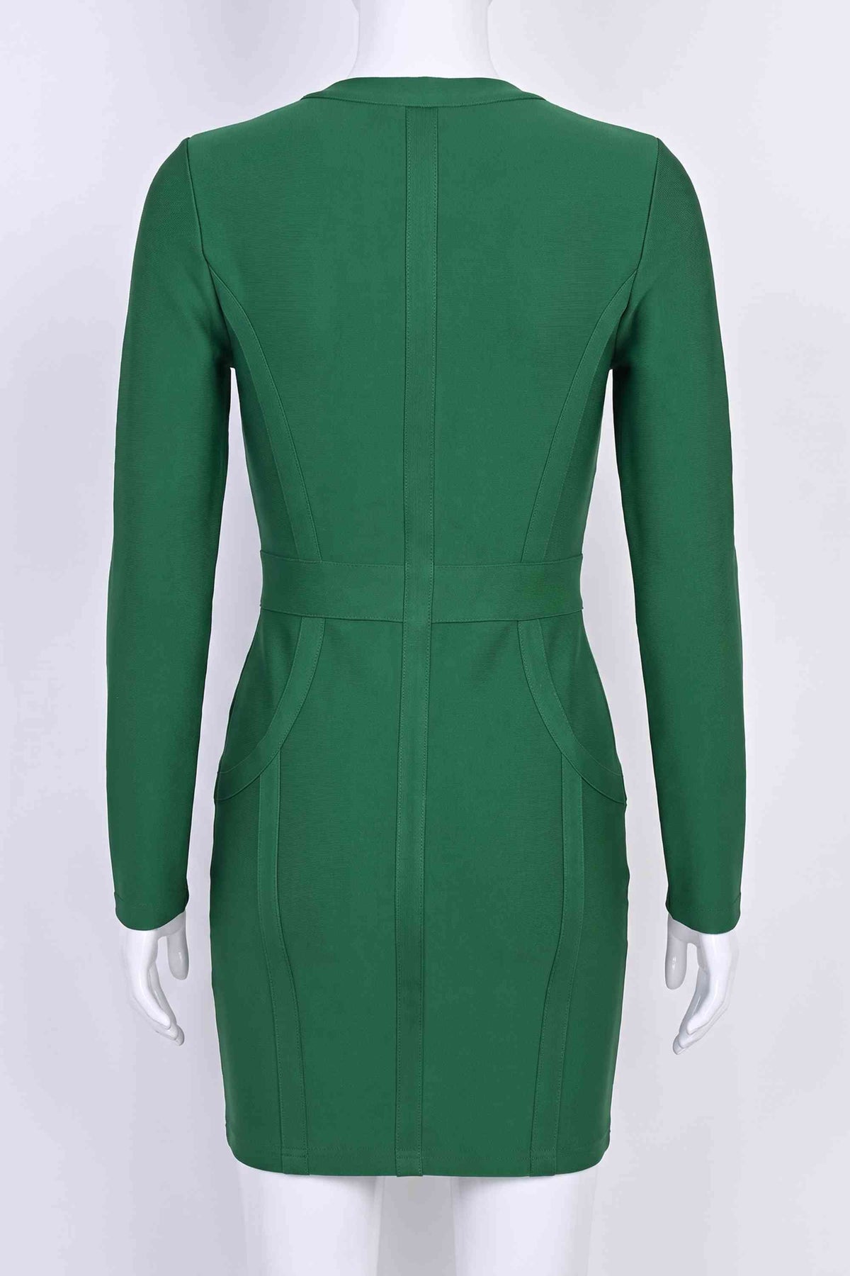 Woman wearing a figure flattering  Eva Long Sleeve Bandage Mini Dress - Emerald Green BODYCON COLLECTION
