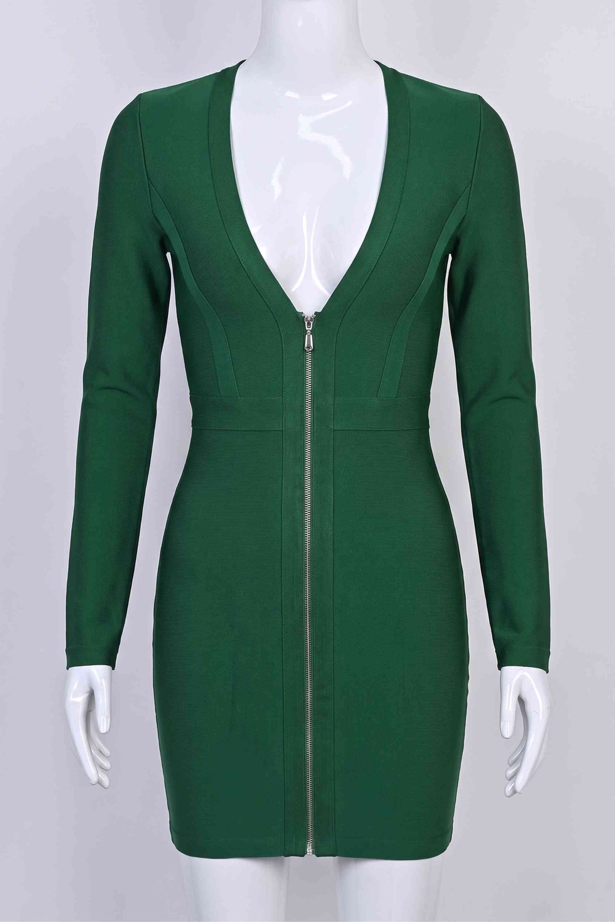 Woman wearing a figure flattering  Eva Long Sleeve Bandage Mini Dress - Emerald Green BODYCON COLLECTION