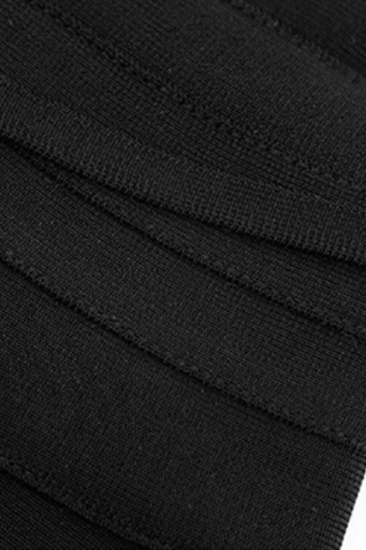 Woman wearing a figure flattering  Eve Bandage Pants Jumpsuit - Classic Black Bodycon Collection