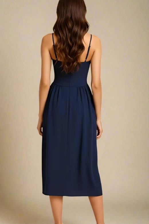 Woman wearing a figure flattering  Everly Midi Dress - Navy Blue BODYCON COLLECTION