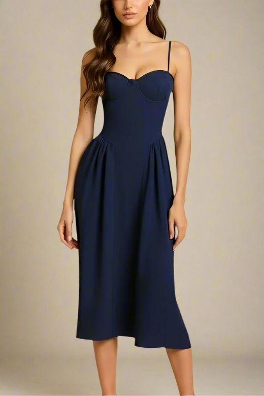 Woman wearing a figure flattering  Everly Midi Dress - Navy Blue BODYCON COLLECTION