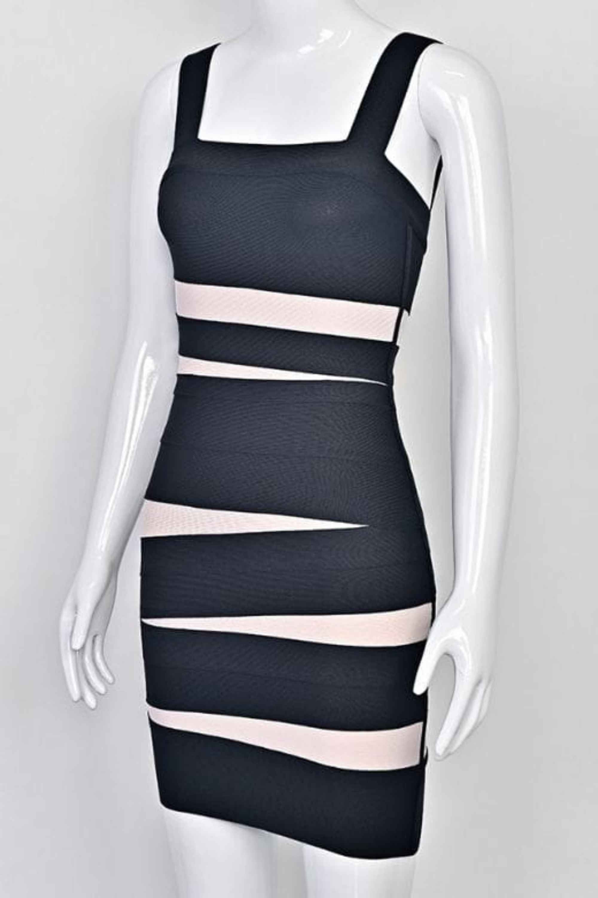 Woman wearing a figure flattering  Fleur Bandage Mini Dress - Classic Black BODYCON COLLECTION Pty Ltd