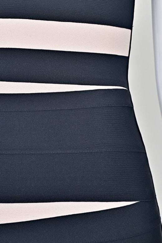 Woman wearing a figure flattering  Fleur Bandage Mini Dress - Classic Black BODYCON COLLECTION Pty Ltd