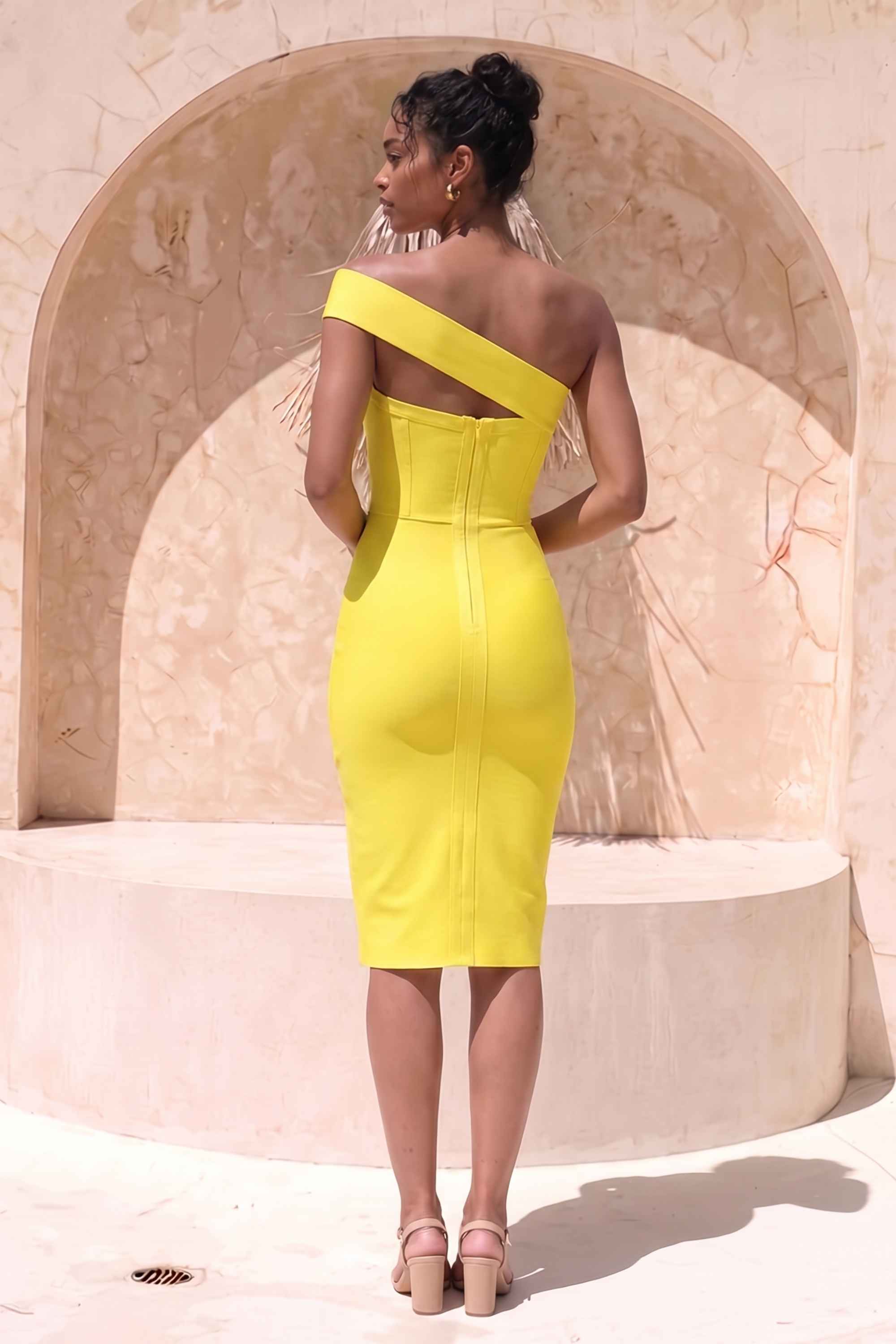 Woman wearing a figure flattering  Gianna Bandage Dress - Sun Yellow BODYCON COLLECTION