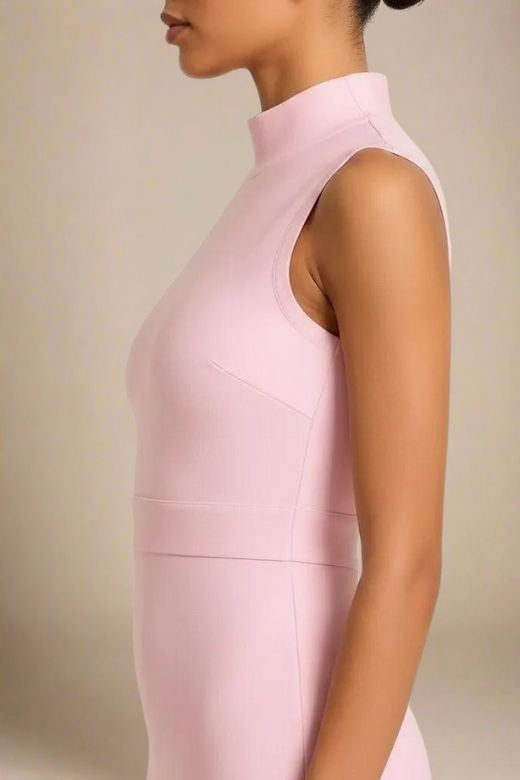 Woman wearing a figure flattering  Grace Bandage Midi Dress - Dusty Pink Bodycon Collection