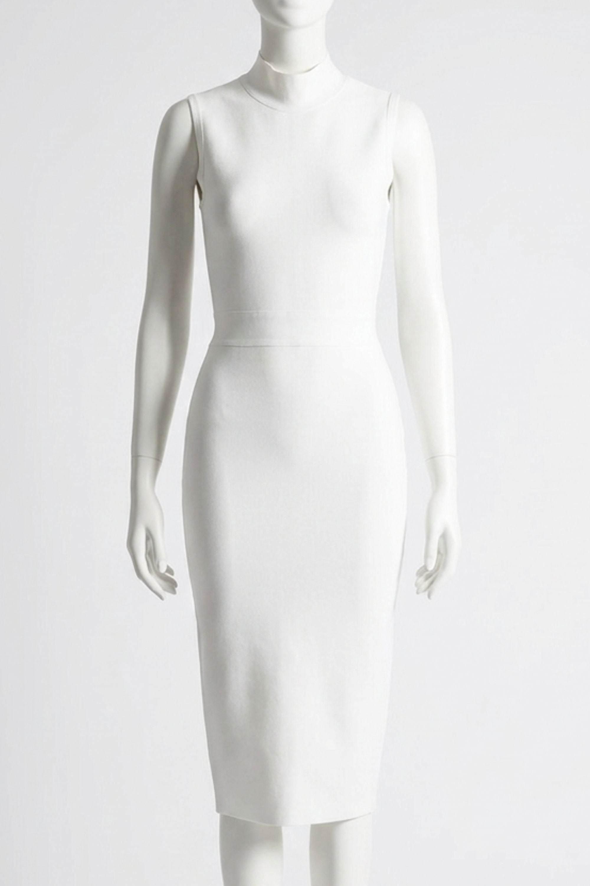 Woman wearing a figure flattering  Grace Bandage Midi Dress - Pearl White Bodycon Collection