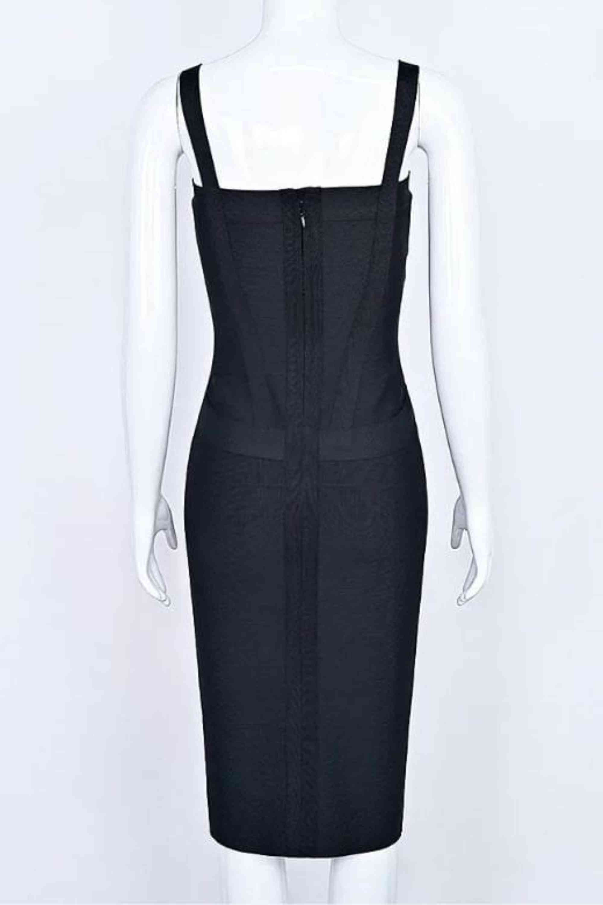 Woman wearing a figure flattering  Heidi Bandage Midi Dress - Classic Black Bodycon Collection