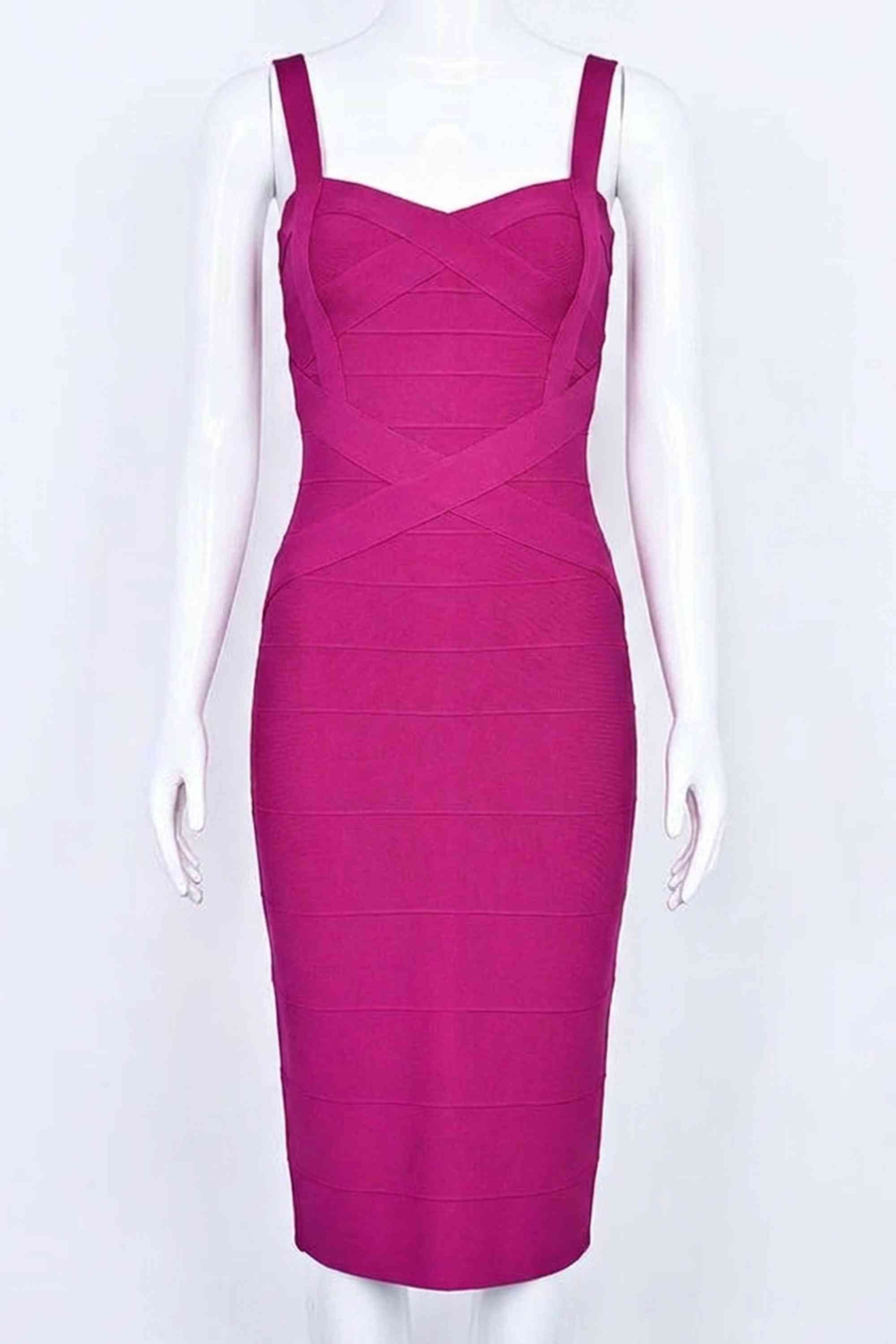 Woman wearing a figure flattering  Heidi Bandage Midi Dress - Magenta Pink Bodycon Collection