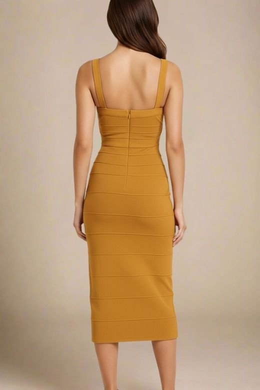 Woman wearing a figure flattering  Heidi Bandage Midi Dress - Mustard Yellow Bodycon Collection
