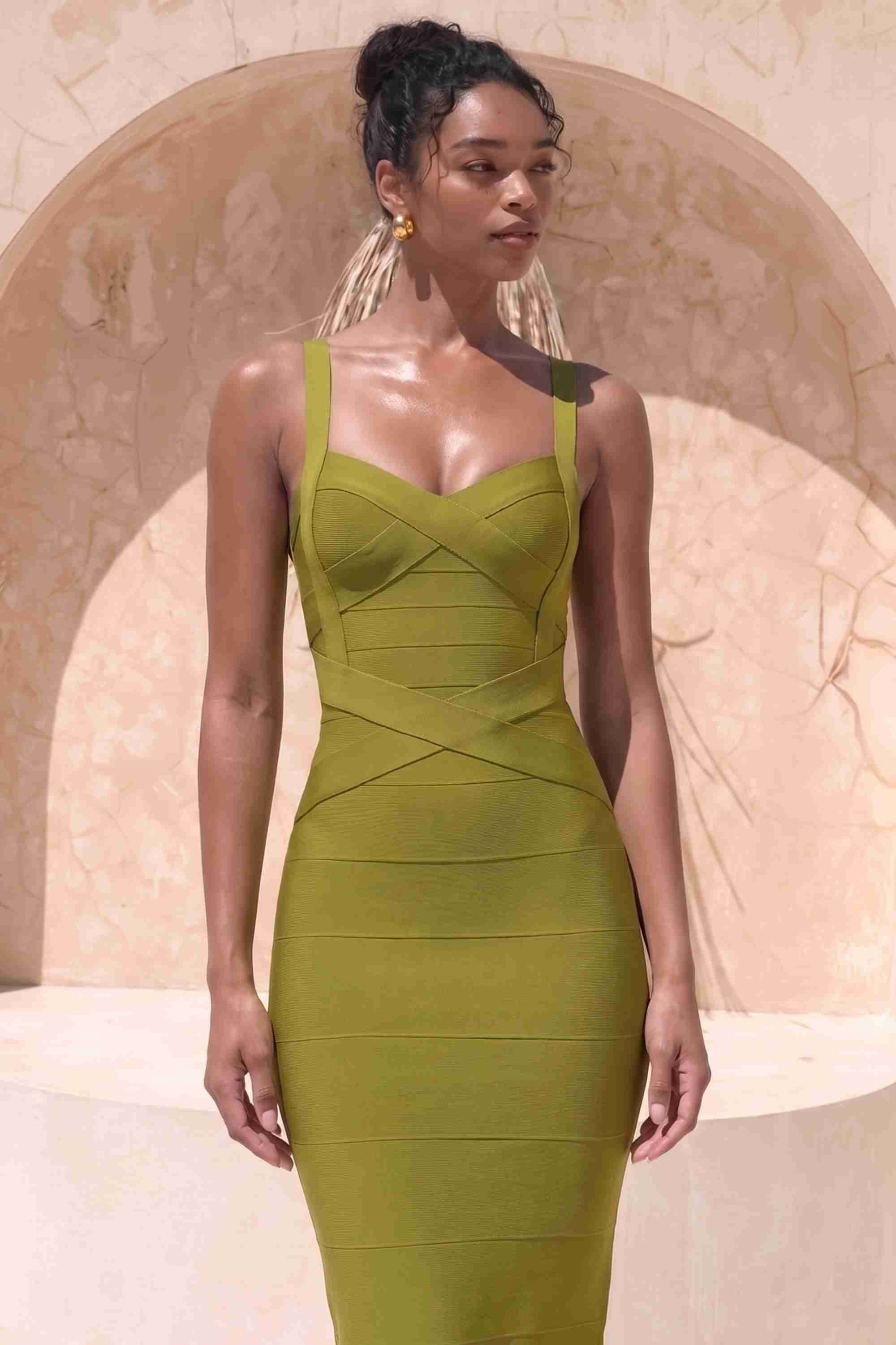 Woman wearing a figure flattering  Heidi Bandage Midi Dress - Olive Green Bodycon Collection