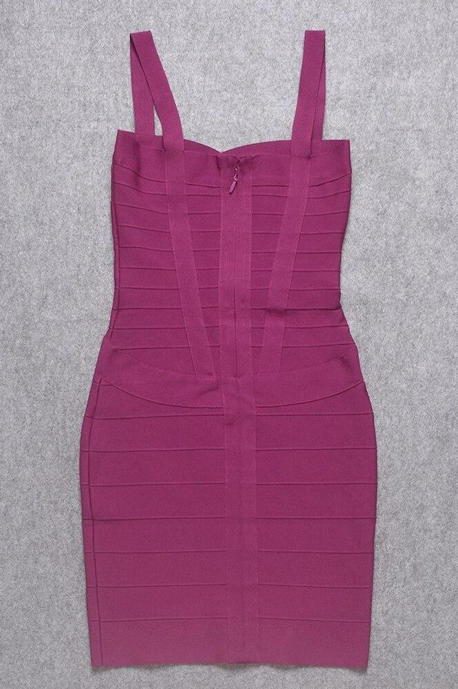 Woman wearing a figure flattering  Heidi Bandage Mini Dress - Magenta Pink Bodycon Collection