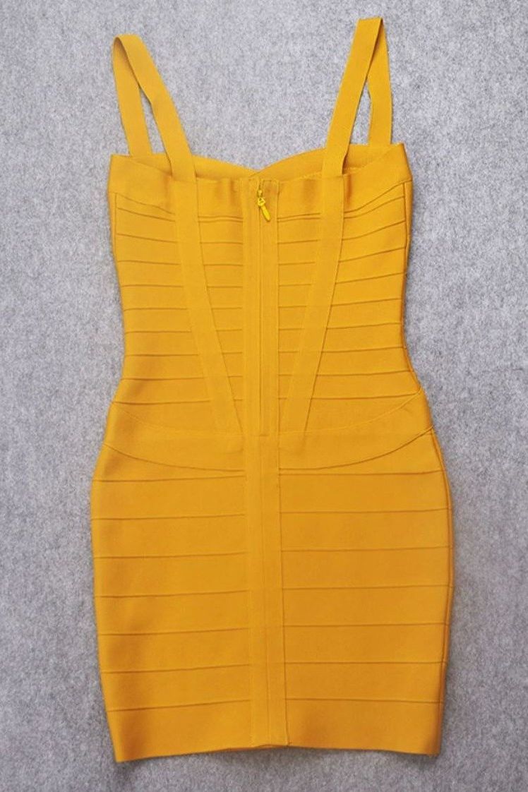 Woman wearing a figure flattering  Heidi Bandage Mini Dress - Mustard Yellow Bodycon Collection