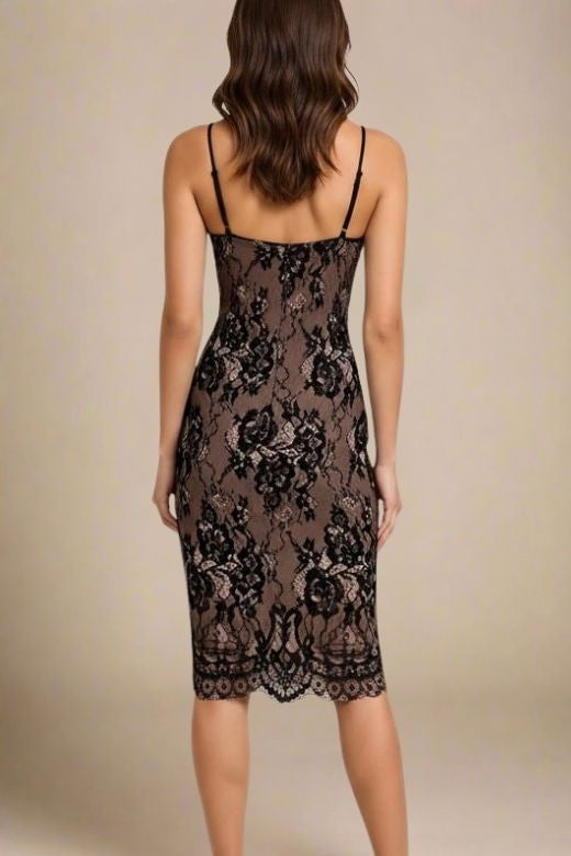 Woman wearing a figure flattering  Joan Bodycon Dress - Classic Black BODYCON COLLECTION