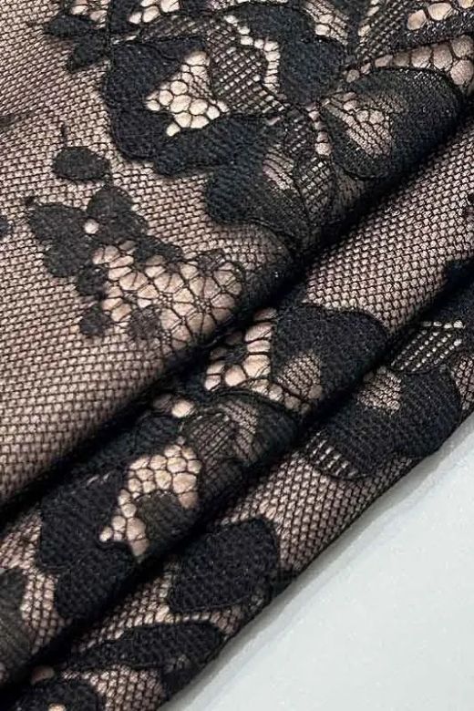 Woman wearing a figure flattering  Joan Bodycon Dress - Classic Black BODYCON COLLECTION