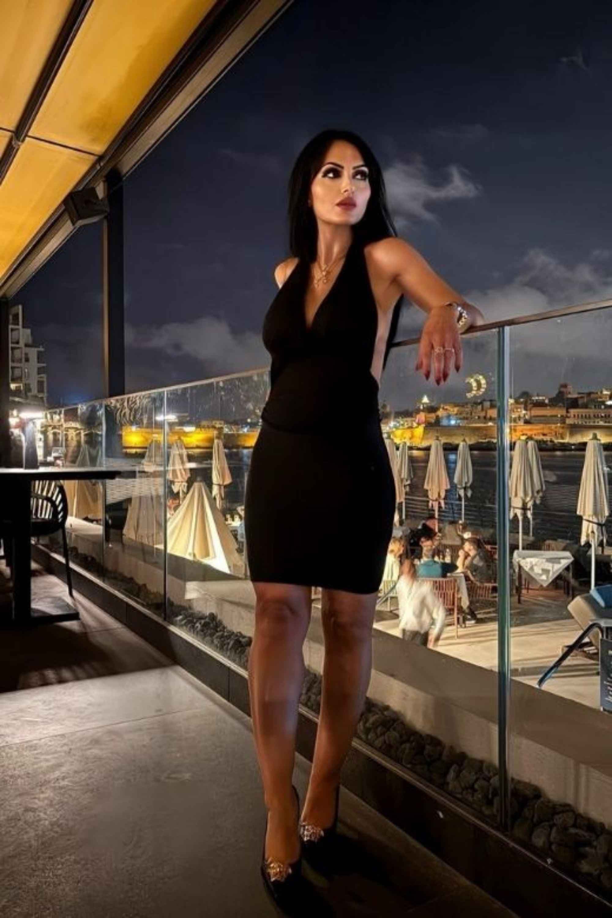 Woman wearing a figure flattering  High Waist Bandage Mini Skirt - White Pearl BODYCON COLLECTION
